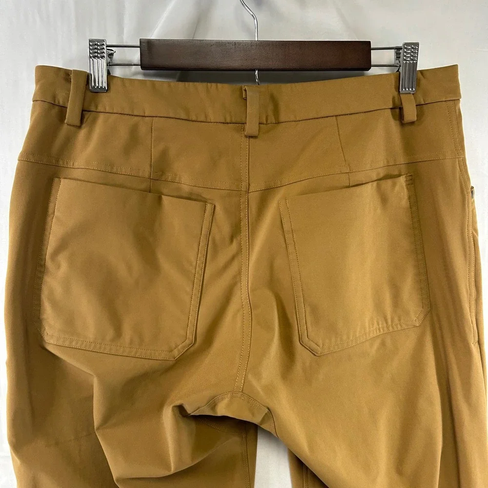 Lululemon ABC Pants Mens 33 Mustard Tan Warpstreme Slim Straight Chino